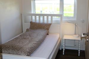 Voodi või voodid majutusasutuse Grímsstaðir holiday home - Family friendly toas