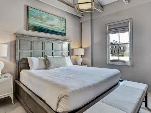 a bedroom with a large bed and a window at Parker's Collection - 8 Bedroom in Savannah +52 photos