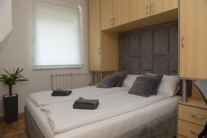 Postel nebo postele na pokoji v ubytování Arena Lux