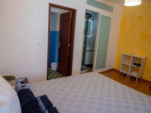 Кровать или кровати в номере Casa D'Olívia