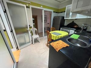 Kuchyň nebo kuchyňský kout v ubytování Inara Appartement