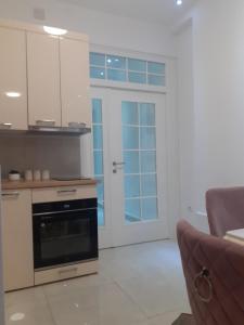 Η κουζίνα ή μικρή κουζίνα στο Beograd /Slavija - fontana 70 m2