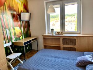 Łóżko lub łóżka w pokoju w obiekcie Kierunek Sopot CENTRUM