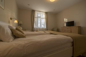 A bed or beds in a room at Villa Lenka