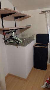 a room with a desk and a chair in a room at A L ESCALE PASSA PAÏS in Le Poujol-sur-Orb