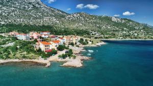 an aerial view of a town on the shore of the water at Ferienhaus Elena, Karlobag in Karlobag