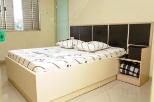 Postel nebo postele na pokoji v ubytování Hotel Tenda Jaçanã