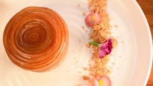a white plate with a piece of food on it at Tabacón Thermal Resort & Spa in Fortuna