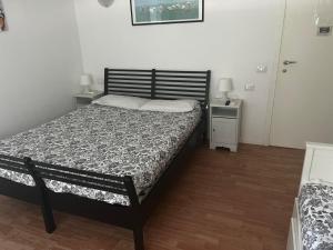 Postel nebo postele na pokoji v ubytování B&B Topaze