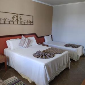 Cama ou camas em um quarto em Granville Eco Resort