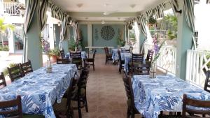 En restaurang eller annat matställe på Pipers Cove Resort