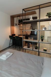 Voodi või voodid majutusasutuse Apartman Resident toas