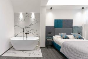 Postel nebo postele na pokoji v ubytování ML luxury room