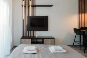 Voodi või voodid majutusasutuse Apartman Resident toas