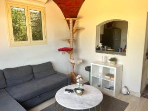 a living room with a couch and a table at Sahure Pyramid View Inn in Cairo
