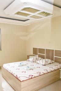 Postel nebo postele na pokoji v ubytování Hotel Tenda Jaçanã