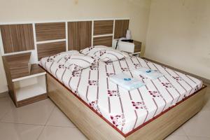 Postel nebo postele na pokoji v ubytování Hotel Tenda Jaçanã