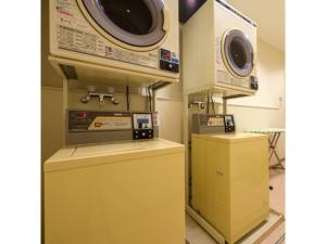 a room with two microwaves and a microwave at Misawa City Hotel - Vacation STAY 81776v in Misawa