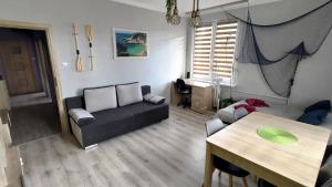 Posezení v ubytování Stylowy apartament w Gdyni z bezpłatnym parkingiem i niedaleko plaży