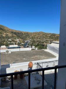 a balcony with a view of a roof at B Collection in Skiros