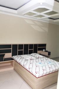 Postel nebo postele na pokoji v ubytování Hotel Tenda Jaçanã