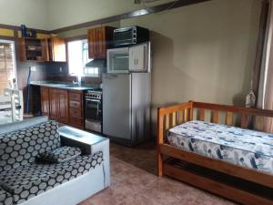 Η κουζίνα ή μικρή κουζίνα στο casa cabaña juanita