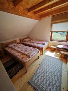 Postel nebo postele na pokoji v ubytování Mini Garden