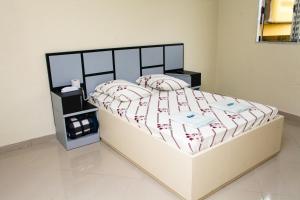 Postel nebo postele na pokoji v ubytování Hotel Tenda Jaçanã