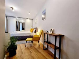 En eller flere senge i et værelse på Studio Blumar 1 in Super Center