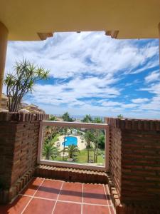 a view from the balcony of a house at Private Room Shared Apartment Sea View Pool Marbella Mijas in Sitio de Calahonda