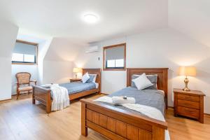 Ένα ή περισσότερα κρεβάτια σε δωμάτιο στο Welcoming Ambiant 3BR Abode