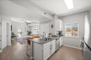 a kitchen with a sink and a counter top at Charming Downtown Getaway in Salt Lake City