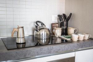 Παροχές για τσάι/καφέ στο Urban Retreat -private parking+terrace