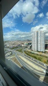 a view of a highway from a window of a building at Toya next in Istanbul
