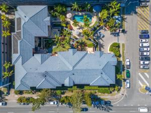 an overhead view of a house with a blue roof at Oceanside Cove in Gold Coast