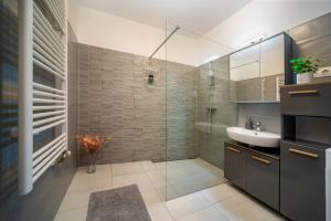 Kúpeľňa v ubytovaní Grace Pine Apartment 2 + 13 fotografií