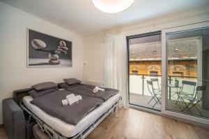 Posteľ alebo postele v izbe v ubytovaní Grace Pine Apartment 2