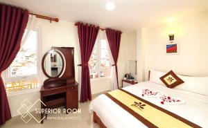 Postel nebo postele na pokoji v ubytování An Phu Hotel Da Lat