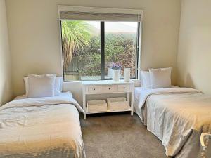 Postel nebo postele na pokoji v ubytování Wanaka Holiday Home