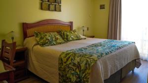 Postel nebo postele na pokoji v ubytování Hotel Ontiveros