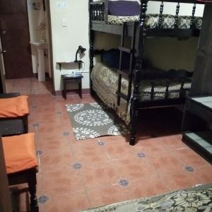 Cama o camas de una habitación en CASA ICHIK ANTIGUA GUATEMALA
