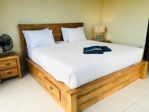 Giường trong phòng chung tại Segara Healing Bali Natural Hot Spring +19 ảnh