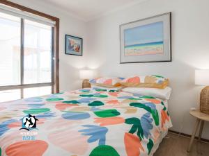 Postel nebo postele na pokoji v ubytování In The Sand Dunes & Renovated House + 18 fotografií