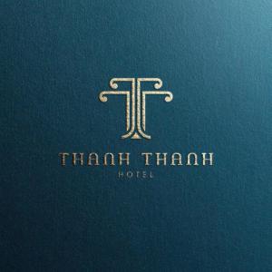 a logo forthan thir hotel on a blue book at Thanh Thanh 2 Hotel in Da Lat