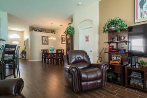 A seating area at Ruskin FL private 2 bdrm 1 bath suite Common areas shared with host