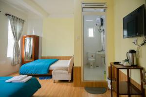 TV a/nebo společenská místnost v ubytování Hân Hoan Hotel
