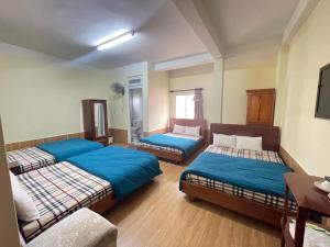Postel nebo postele na pokoji v ubytování Hân Hoan Hotel