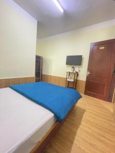 Postel nebo postele na pokoji v ubytování Hân Hoan Hotel