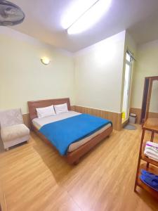Postel nebo postele na pokoji v ubytování Hân Hoan Hotel