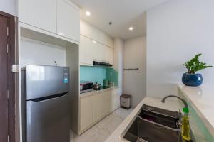 Nhà bếp/bếp nhỏ tại Chau Apartments - Infinity pool- Ben Thanh